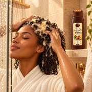 Shampooing Argan Plus Net-Care utilisé dans une douche premium